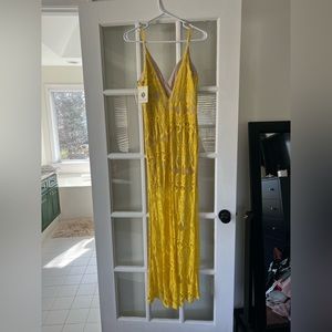 Bright yellow lace dress with slit in front from Hello Molly!